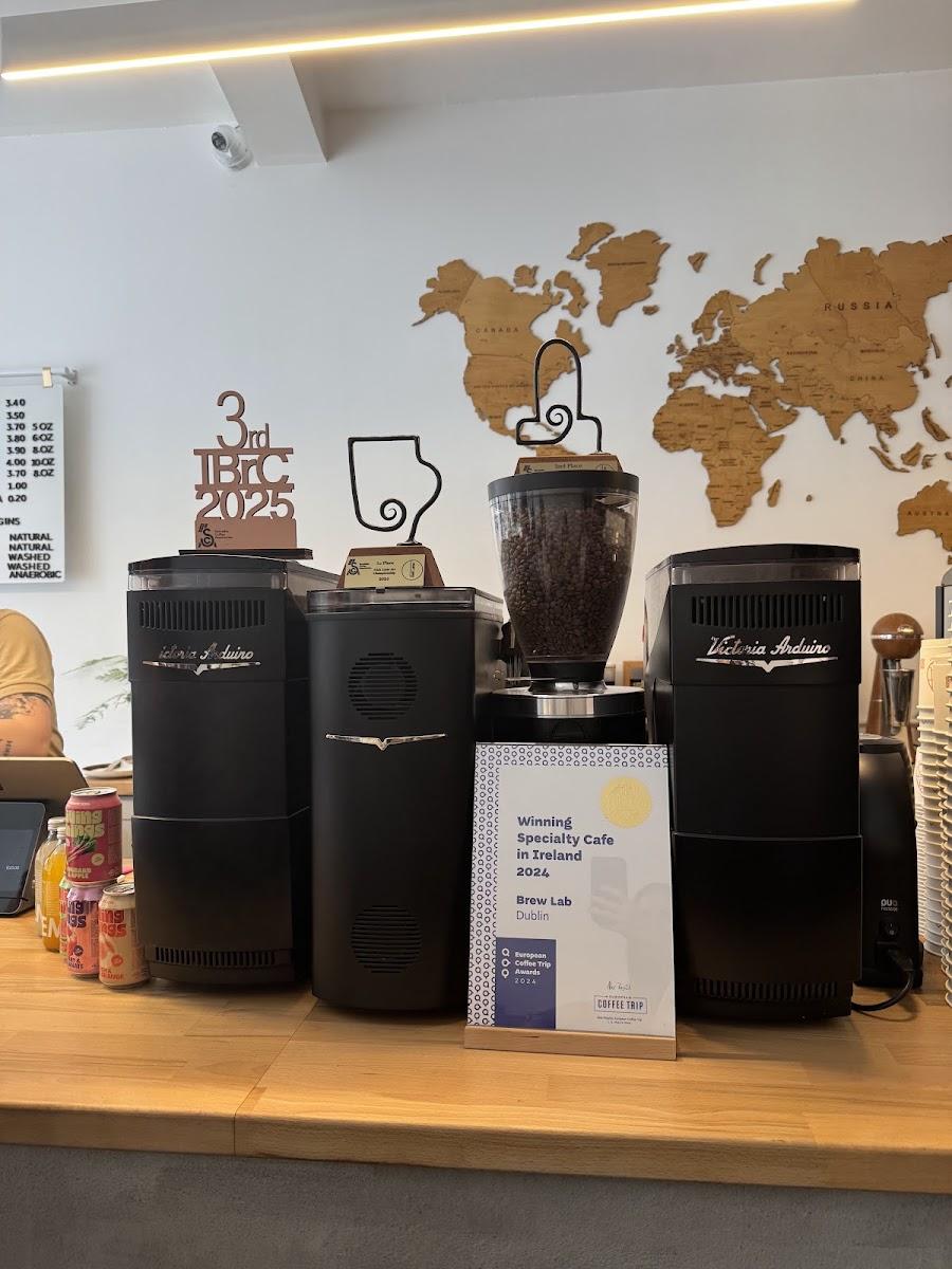 Coffee equipment and awards at Brew Lab’s bar
